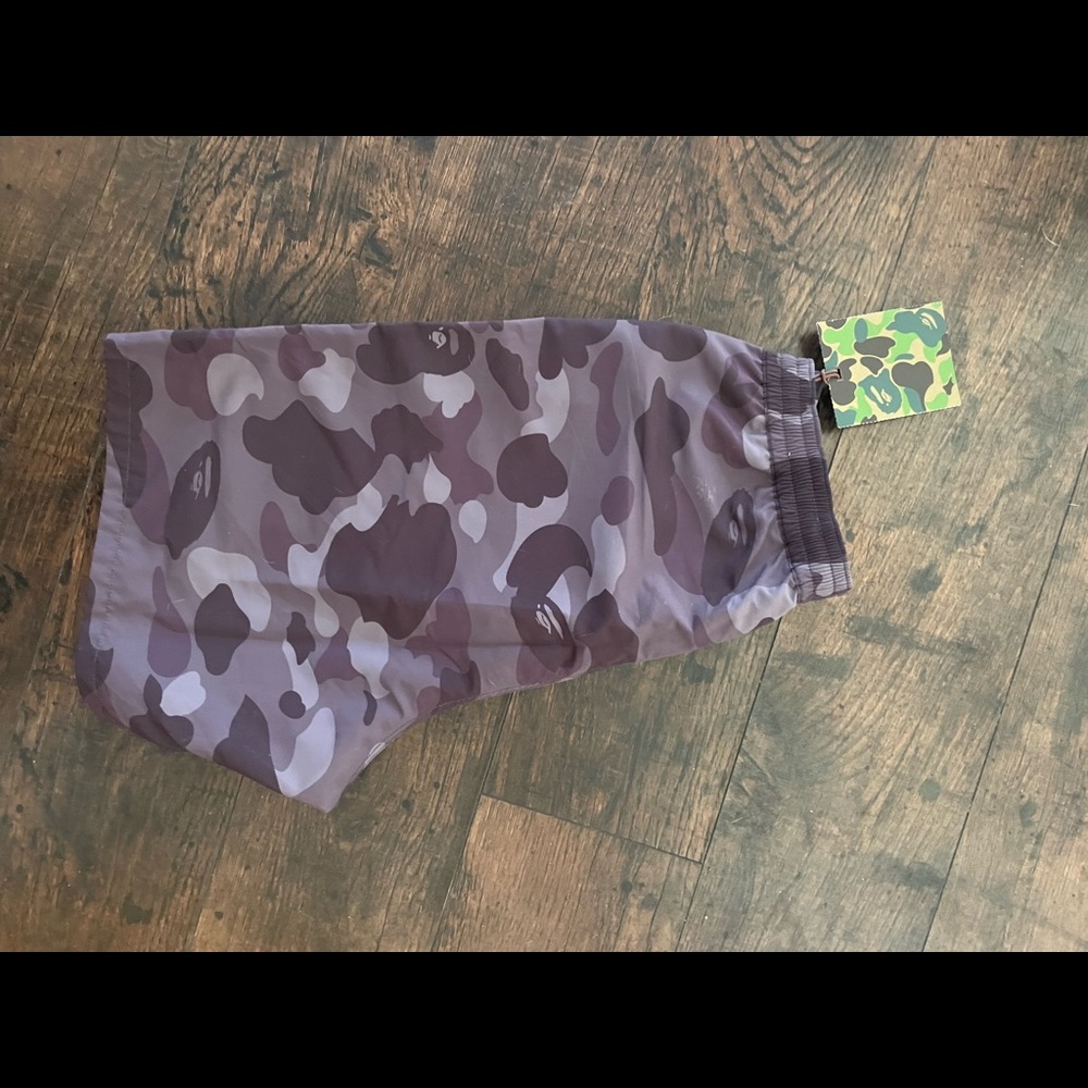 Reversible BAPE shorts. Black one side, camouflage other side.